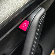 Premium colorful suede door open button cover stickers applied to a Tesla interior door panel, showing a precise cut matching the door release switch.