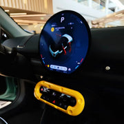 cheese-style center console decor cover installed on a MINI Cooper dashboard