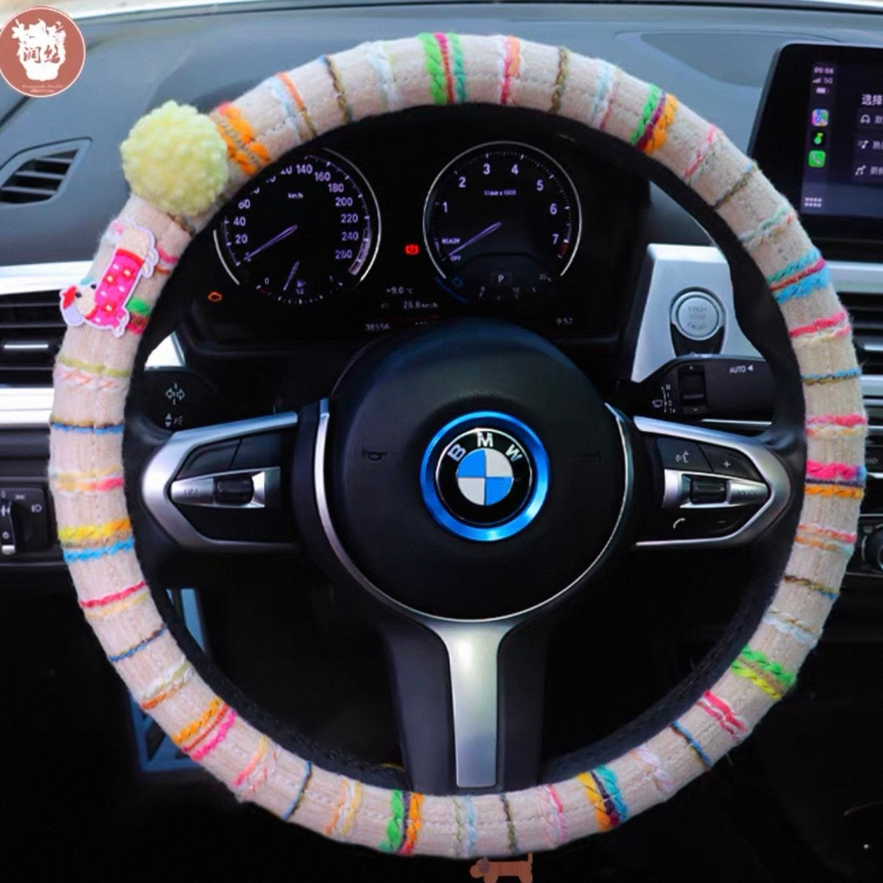 Boho striped fabric steering wheel covers with dachshund patches and fluffy pom poms