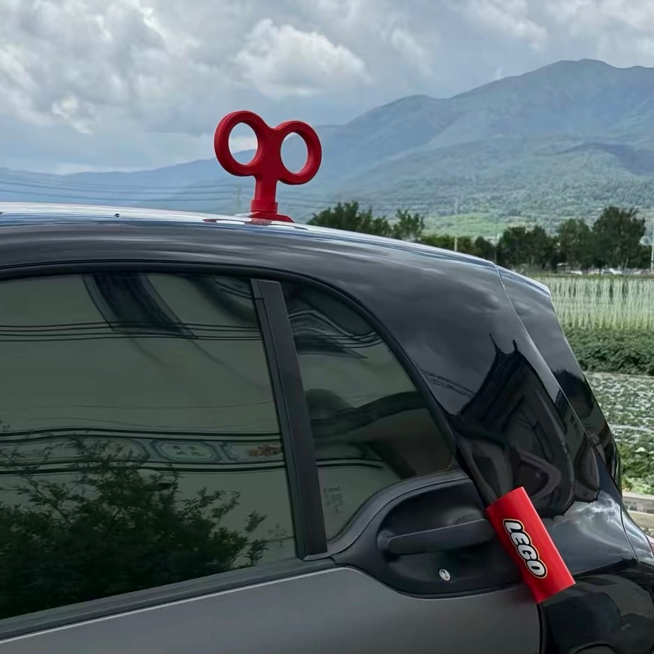 Red Solar-Powered Wind-Up Key Car Roof Decoration | Cute Spinning Accessory for Cars & EVs