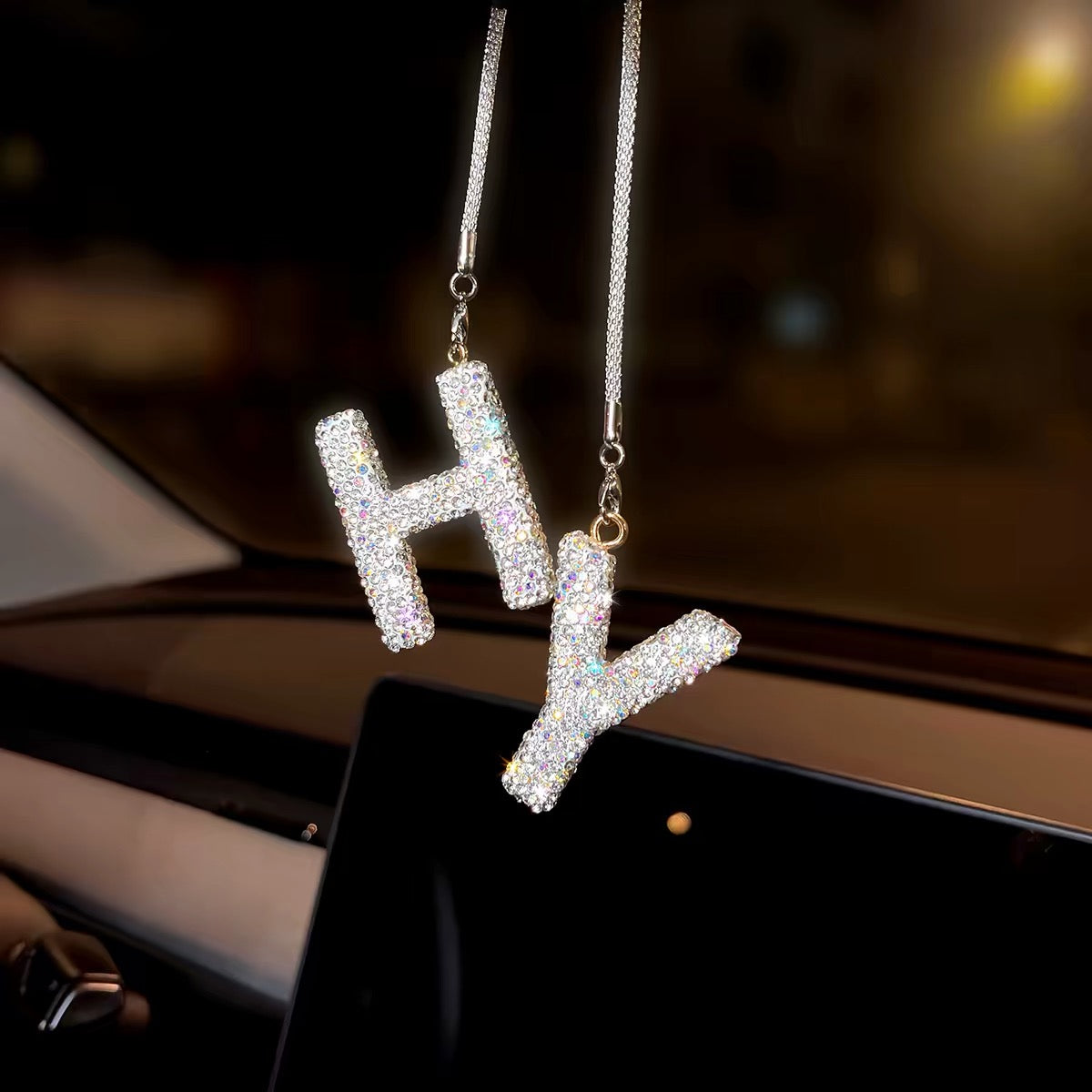 Crystal initial car charm installed on rearview mirror, 8-inch length shown in vehicle interior without blocking view Letter H Y