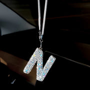 Rhinestone letter charm paired with heart and feather pendant hanging together on car rearview mirror Letter N