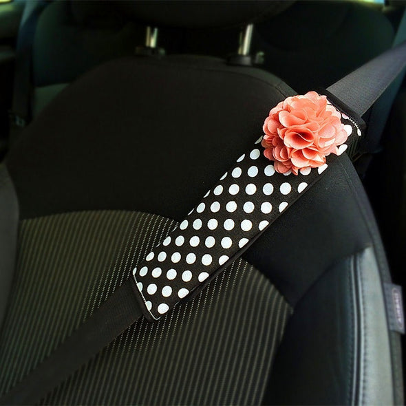 a black and white polka dot tie is shown 